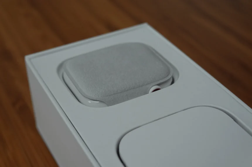 White Ceramic Apple Watch Edition Resting On A Surface